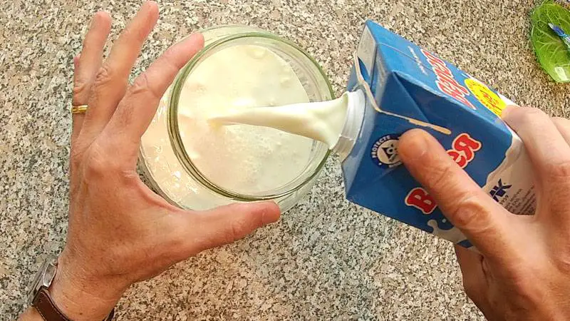 Add milk to the grains